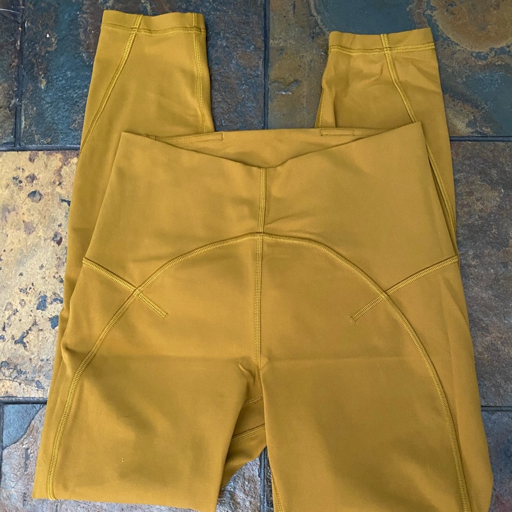 Lululemon Unlimit High Rise Tight 25”, size 6, Gold Spice